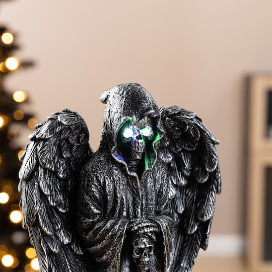 Glitzhome® 12" Halloween Lighted Resin Grim Reaper Table Decor with Timer